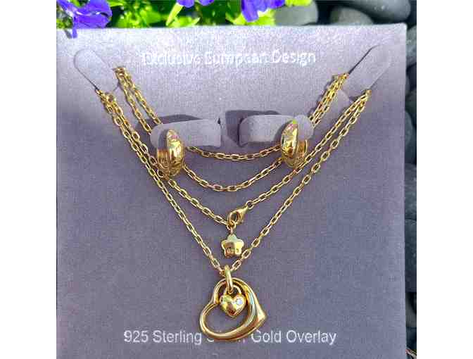 Hearts in Harmony Earrings & Necklace in yellow gold!