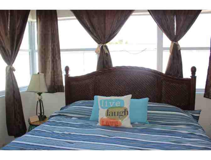 Paddleboard or Kayak + 10 nights Luxury Daytona 3 bed Beach House + $100 Food Credit