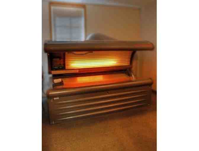 $50 Gift Certificate for Any Tanning Service at Escape Tanning and Salon - Photo 1