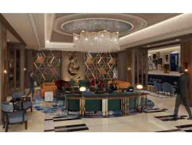 Exclusive Family Portrait plus Luxury Hotel Stay in New York or Miami!