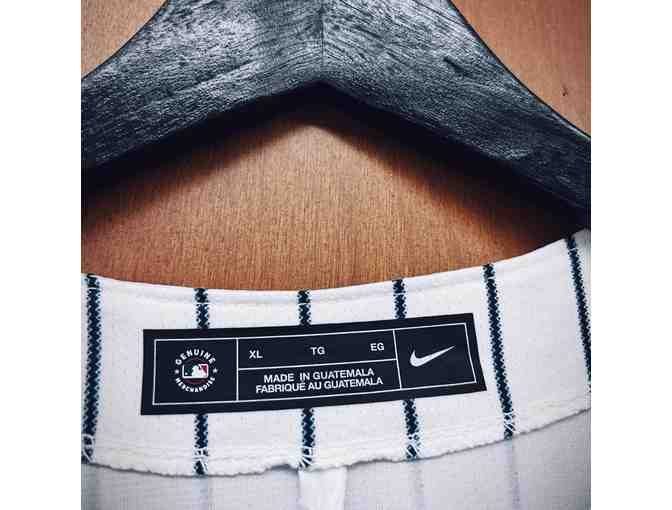 Signed Yankees Jersey by Mariano Rivera & Exclusive Yankees/Lehman Cap